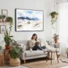 02 - Framed Great Sand Dunes National Park Watercolor - Horizontal Canvas Print - Boho Living Room with Woman reading.jpg