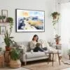 02 - Framed Guadalupe Mountains National Park Watercolor - Horizontal Canvas Print - Boho Living Room with Woman reading.jpg