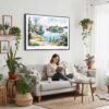 02 - Framed Isle Royale National Park Watercolor - Horizontal Canvas Print - Boho Living Room with Woman reading.jpg
