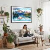 02 - Framed Lake Clark National Park Watercolor - Horizontal Canvas Print - Boho Living Room with Woman reading.jpg