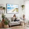 02 - Framed Outer Banks NC Watercolor - Horizontal Canvas Print - Boho Living Room with Woman reading.jpg