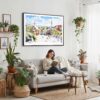 02 - Framed Park Guell Spain Watercolor Art - Horizontal Canvas Print - Boho Living Room with Woman reading.jpg