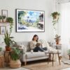 02 - Framed Seattle Skyline Watercolor Art - Horizontal Canvas Print - Boho Living Room with Woman reading.jpg