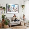 02 - Framed Tokyo Tower Watercolor Art - Horizontal Canvas Print - Boho Living Room with Woman reading.jpg