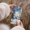 04 - Nothern Lights Finland Watercolor Art Phone Case - Female hand.jpg