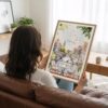 05 - Woman Holding Framed Morning Coffee in Amsterdam Watercolor Art Print - Vertical.jpg