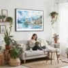 02 - 02 - Framed Interlaken Watercolor - Horizontal Canvas Print - Boho Living Room with Woman reading.jpg