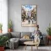 02 - Dublin Ireland Watercolor Canvas Print with Natural Floater Frame - Woman Knitting on grey couch - Vertical.jpg