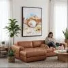 02 - Framed Arches National Park Watercolor Canvas Print - Woman Knitting on leather couch - Vertical.jpg