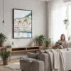 02 - Framed Bergen Norway Houses Watercolor Canvas Print - Woman reading in modern Living Room - Vertical.jpg