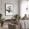 02 - Framed Brooklyn Bridge - Pencil Drawing Canvas Print - Woman reading in modern Living Room - Vertical.jpg