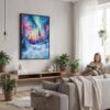 02 - Framed Fairbanks Northern Lights watercolor Canvas Print - Woman reading in modern Living Room - Vertical.jpg