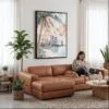 02 - Framed Miami Florida Sunset Watercolor Canvas Print - Woman Knitting on leather couch - Vertical.jpg