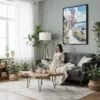02 - Framed San Francisco Golden Gate Bridge - Watercolor Canvas Print - Woman reading in Boho Living Room - Vertical.jpg