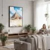 02 - Framed The Pyramids of Giza Watercolor Canvas Print - Woman reading in modern Living Room - Vertical.jpg