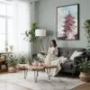 02 - Framed Tokyo Sakura - Watercolor Canvas Print - Woman reading in Boho Living Room - Vertical.jpg