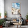 02 - Indiana Dunes National Park Watercolor Canvas Print with Natural Floater Frame - Woman Knitting on grey couch - Vertical.jpg