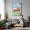 02 - Seville Plaza De Espana Watercolor Canvas Print with Natural Floater Frame - Woman Knitting on grey couch - Vertical.jpg