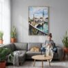 02 - Zurich Switzerland Watercolor Canvas Print with Natural Floater Frame - Woman Knitting on grey couch - Vertical.jpg