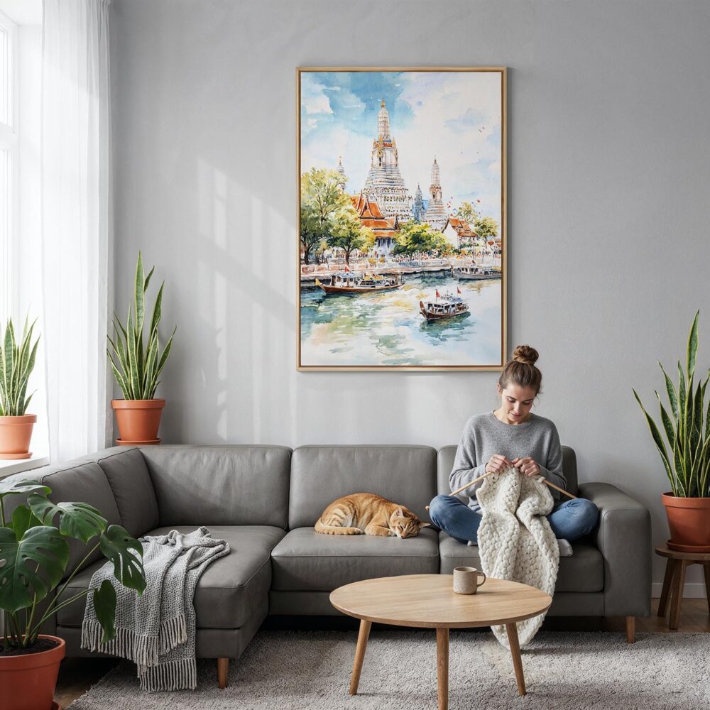 03 - Bangkok Wat Arun Watercolor Canvas Print with Natural Floater Frame - Woman Knitting on grey couch - Vertical.jpg 03 - Bangkok Wat Arun Watercolor Canvas Print with Natural Floater Frame - Woman Knitting on grey couch - Vertical.jpg