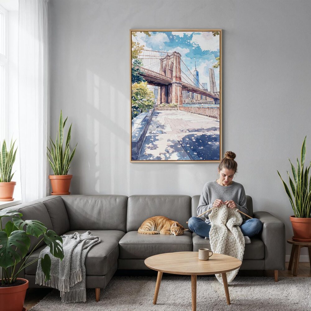 03 - Brooklyn Bridge - Watercolor Canvas Print with Natural Floater Frame - Woman Knitting on grey couch - Vertical.jpg 03 - Brooklyn Bridge - Watercolor Canvas Print with Natural Floater Frame - Woman Knitting on grey couch - Vertical.jpg