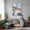 03 - Brooklyn Bridge - Watercolor Canvas Print with Natural Floater Frame - Woman Knitting on grey couch - Vertical.jpg