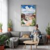 03 - Canyonlands Watercolor Canvas Print with Natural Floater Frame - Woman Knitting on grey couch - Vertical.jpg