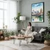 03 - Framed Cincinnati Ohio Watercolor Canvas Print - Woman reading in Boho Living Room - Vertical.jpg