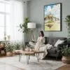 03 - Framed France Mont Saint Michel Watercolor Canvas Print - Woman reading in Boho Living Room - Vertical.jpg