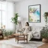 03 - Framed La Jolla Cove Watercolor Canvas Print - Woman reading on couch - Vertical.jpg