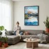 03 - Framed Lake Clark National Park Watercolor Canvas Print - Woman Knitting on grey couch - Vertical.jpg