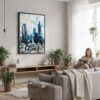 03 - Framed London Business Skyline Watercolor Canvas Print - Woman reading in modern Living Room - Vertical.jpg