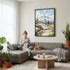 03 - Framed Mount Rainier - Watercolor Canvas Print - Woman Knitting on grey couch - Vertical.jpg