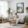 03 - Framed Olympic National Park Watercolor Canvas Print - Woman reading on couch - Vertical.jpg