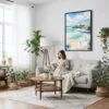 03 - Framed San Diego Beach Watercolor Canvas Print - Woman reading on couch - Vertical.jpg