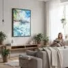 03 - Framed Tahiti Watercolor Canvas Print - Woman reading in modern Living Room - Vertical.jpg