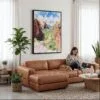 03 - Framed Zion Canyon Watercolor Canvas Print - Woman Knitting on leather couch - Vertical.jpg