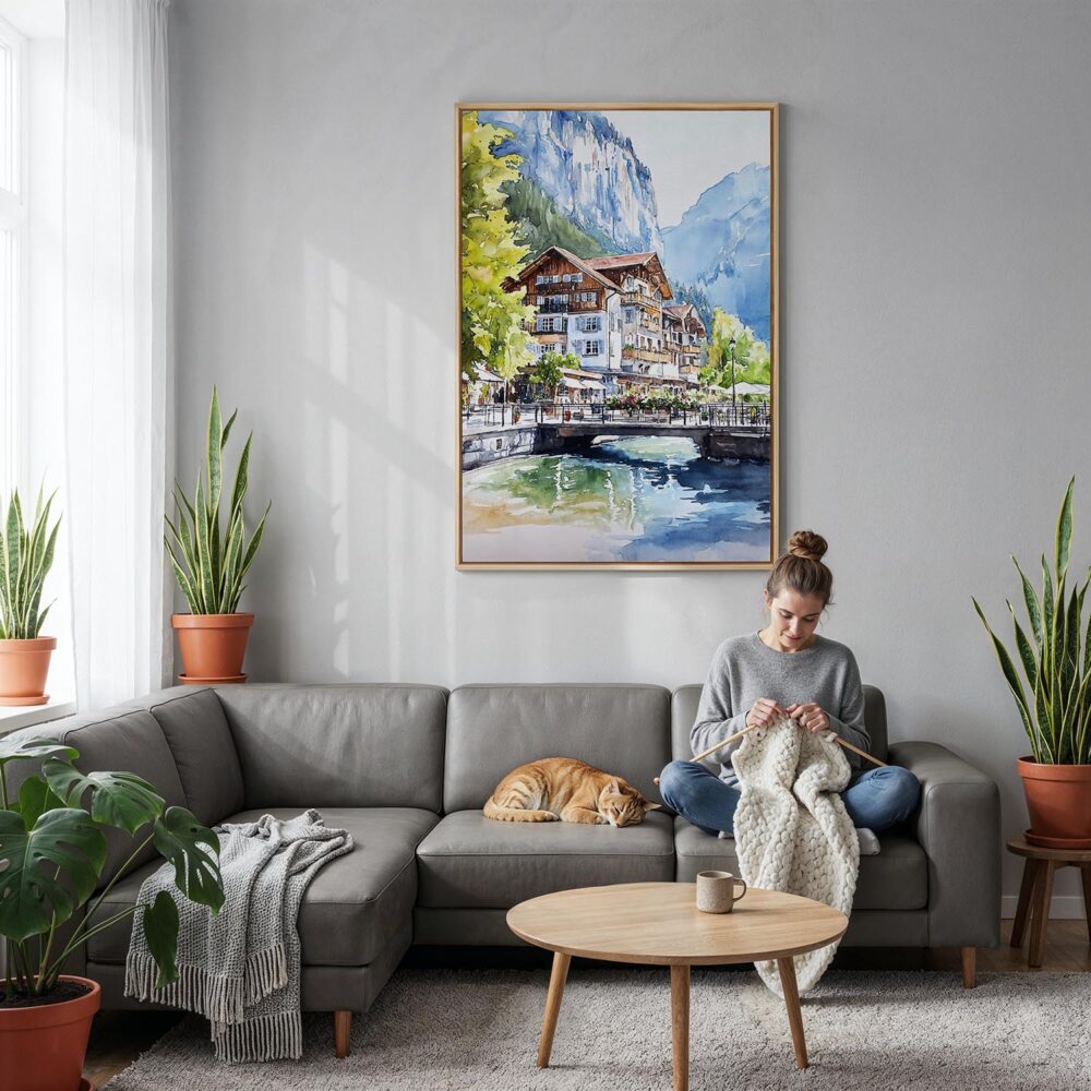 03 - Lauterbrunnen Switzerland Watercolor Canvas Print with Natural Floater Frame - Woman Knitting on grey couch - Vertical.jpg 03 - Lauterbrunnen Switzerland Watercolor Canvas Print with Natural Floater Frame - Woman Knitting on grey couch - Vertical.jpg