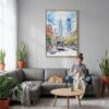 03 - Philadelphia Downtown Canvas Print with Natural Floater Frame - Woman Knitting on grey couch - Vertical.jpg