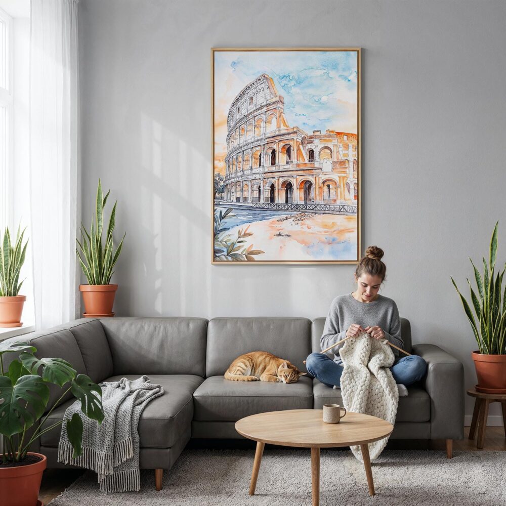 03 - Rome Colosseum Watercolor Canvas Print with Natural Floater Frame - Woman Knitting on grey couch - Vertical.jpg 03 - Rome Colosseum Watercolor Canvas Print with Natural Floater Frame - Woman Knitting on grey couch - Vertical.jpg