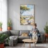03 - Serengeti Canvas Print with Natural Floater Frame - Woman Knitting on grey couch - Vertical.jpg