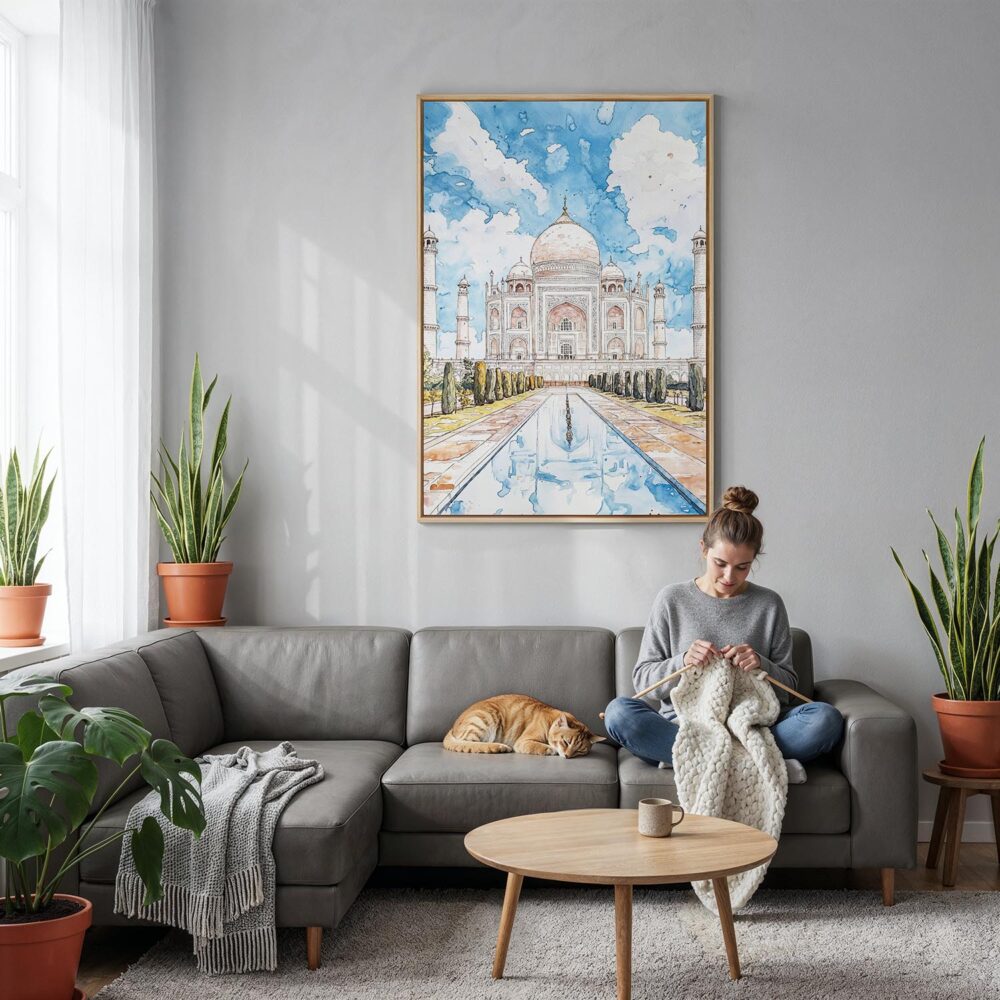 03 - Taj Mahal Vibrant Watercolor Canvas Print with Natural Floater Frame - Woman Knitting on grey couch - Vertical.jpg 03 - Taj Mahal Vibrant Watercolor Canvas Print with Natural Floater Frame - Woman Knitting on grey couch - Vertical.jpg