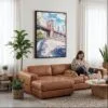 04 - Framed Brooklyn Bridge - Watercolor Canvas Print - Woman Knitting on leather couch - Vertical.jpg