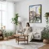 04 - Framed Bruges Belgium Watercolor Canvas Print - Woman reading on couch - Vertical.jpg