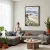 04 - Framed Cannon Beach Oregon Watercolor Canvas Print - Woman Knitting on grey couch - Vertical.jpg