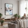 04 - Framed Central Park New York City Watercolor Canvas Print - Woman reading in modern Living Room - Vertical.jpg