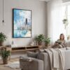 04 - Framed Chicago Skyline Watercolor Canvas Print - Woman reading in modern Living Room - Vertical.jpg