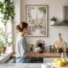04 - Framed Cozy Paris Cafe Streetscene with Eiffel Tower Watercolor@2x Art Print hanging in Kitchen with woman making coffee.jpg