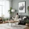 04 - Framed Empire State Building - Pencil Drawing Canvas Print - Woman reading in Boho Living Room - Vertical.jpg