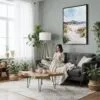 04 - Framed Ireland - Donegal - Watercolor Canvas Print - Woman reading in Boho Living Room - Vertical.jpg